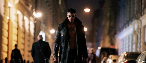 Bill Skarsgård donning a leather jacket in the 2024 remake of 'The Crow'.