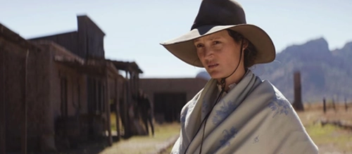 Vicky Krieps in a full cowboy outfit for the 2024 western 'The Dead Don't Hurt'.